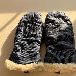 North Face blue and white striped mittens with faux fur lining